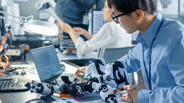Man and woman using technology in an innovation centre