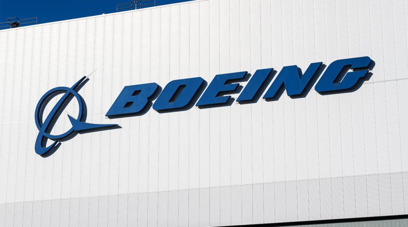 Boeing logo on white building to support strike recovery article