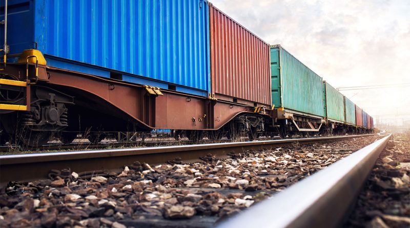 rail freight with cargo on tracks to support NSW article