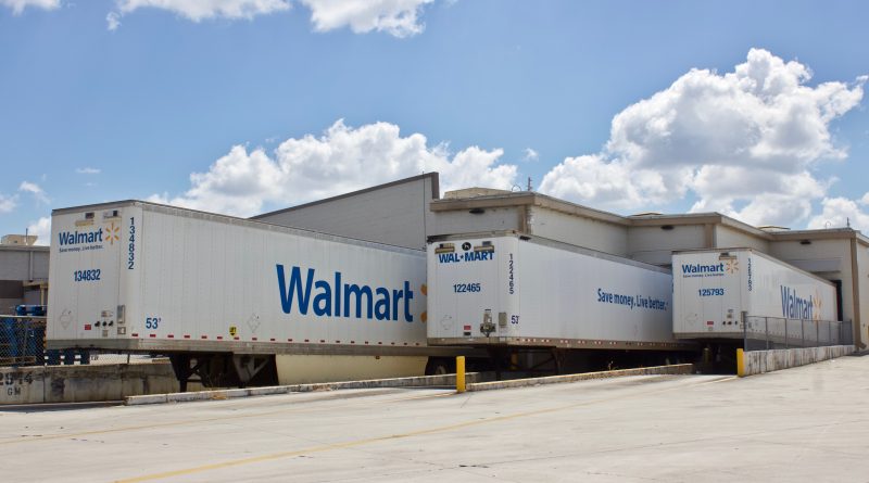 3 Walmart trailers at a supercenter receiving dock without tractors