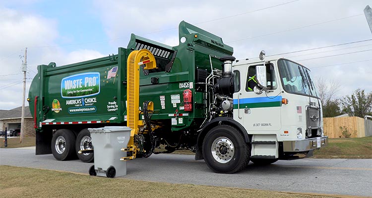 a Waste Pro USA refuse truck, which is used for collecting solid waste and recycling.
