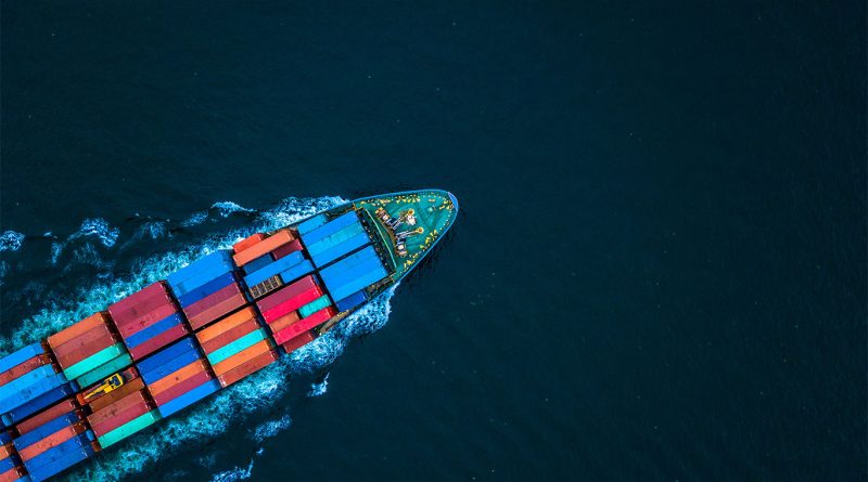 Container ships docked at a US port during a slowdown in October trade volumes