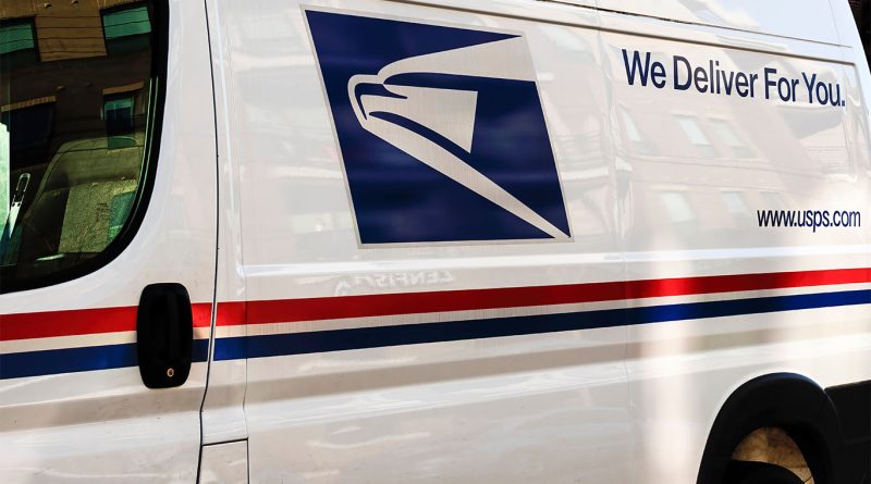 USPS delivery trucks at a postal facility as the agency expands last mile supply chain access through a new bidding platform