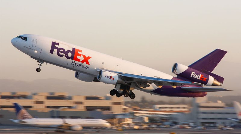 FedEx cargo aircraft and delivery trucks highlighting shift toward high margin B2B and premium e commerce shipping